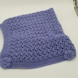 Hand knitted cornflower blue baby blanket with knit flower accents. 32 "x 32"